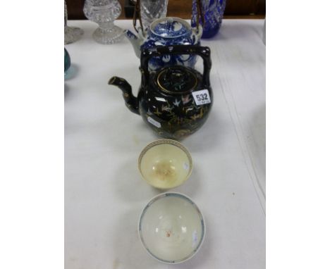 Two Antique Tea Bowls together with 19th century Black Ceramic Kettle decorated with Oriental Figures and a Blue and White Sa