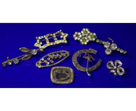 Collection Of 8 Vintage Brooches To Include A Silver Horseshoe With Riding Crop And Gold Isle Of Man Motif, Some Stone Set, M