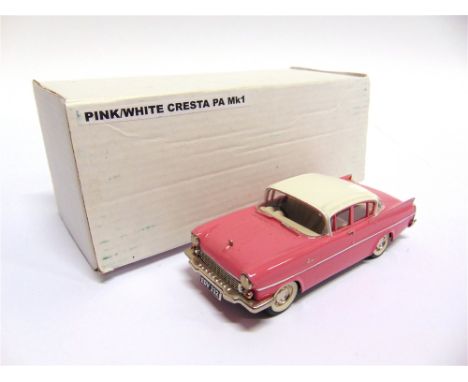 [WHITE METAL]. A HAND-BUILT VAUXHALL CRESTA PA MK 1  white over pink, with white-wall tyres, mint, in a plain card box.