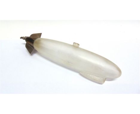 A FROSTED GLASS DECANTER IN THE FORM OF AN AIRSHIP  fitted with metal tail fins, 37.5cm long.