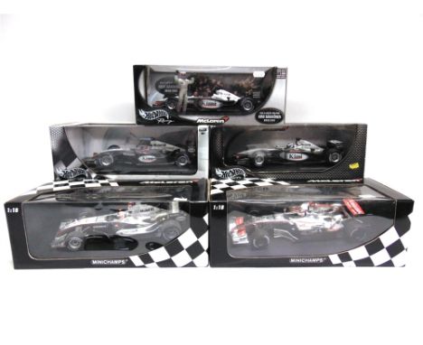 FIVE 1/18 SCALE MCLAREN FORMULA 1 RACING CARS  comprising a Hot Wheels McLaren Mercedes MP4-17 (K. Raikkonen); Hot Wheels McL