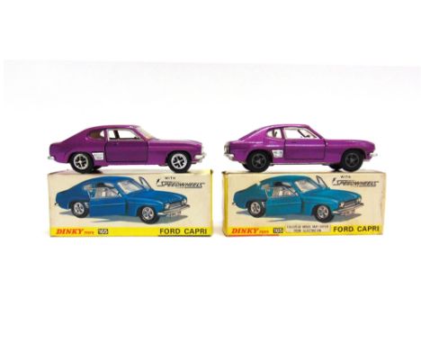 TWO DINKY NO.165, FORD CAPRIS  the first metallic purple, with cast metal wheels, generally good condition (silver window-fra