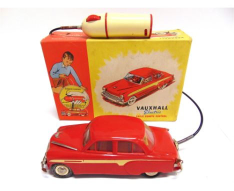 A WELSOTOYS NO.101, VAUXHALL CRESTA  the crimson plastic body with cream side stripes, with a battery-operated cable remote c