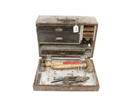 An engineers small tool box with few tools G