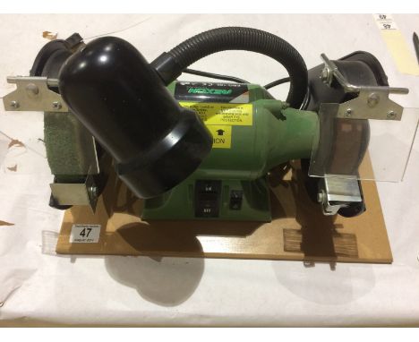 A REXON bench grinder