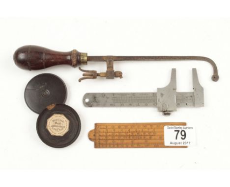 A 4" boxwood scale, a lignum box, caliper gauge and an early small hacksaw G