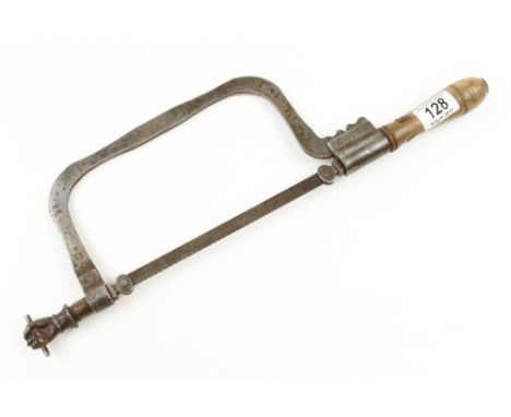 An unusual steel frame saw with 8" hacksaw blade and added tensioner G
