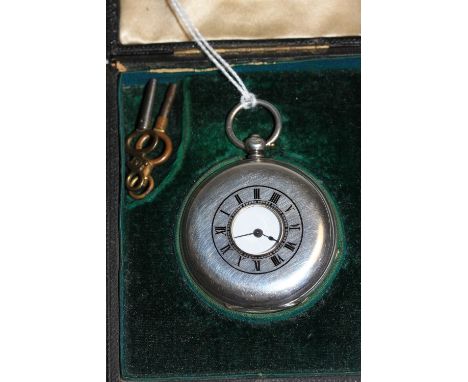A silver half-hunting key wind watch, the enamel dial with Roman numerals and blued hands, enamelled chapter to case. Birming