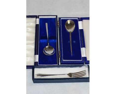 A cased silver replica of a roman spoon, another cased silver spoon and a cased silver pastry fork