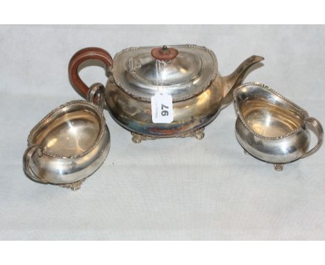 A George V silver three piece tea service comprising teapot, sucrier and milk jug. Sheffield 1928. 36oz 16dwts gross