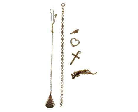 A collection of 9ct gold jewellery, comprising a gold brooch modelled as a salamander, with five red stones down its back, 4.