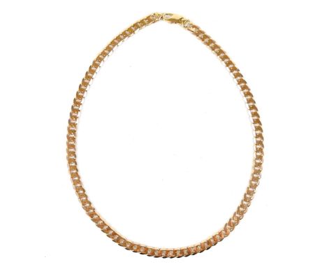 A 9ct gold curb link chain necklace, 65.0g, 60cm long. 