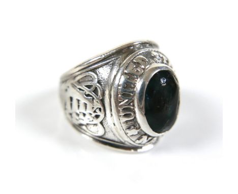 A silver United States Navy dress ring, set with a blue stone to the centre, a/f worn, size R, 18.5g. 