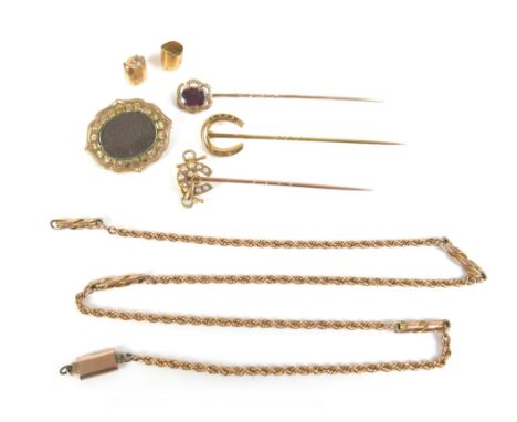 An 18ct gold and seed pearl stick pin, 1.9g, 5.5cm long, together with a group of yellow metal items, including two other sti