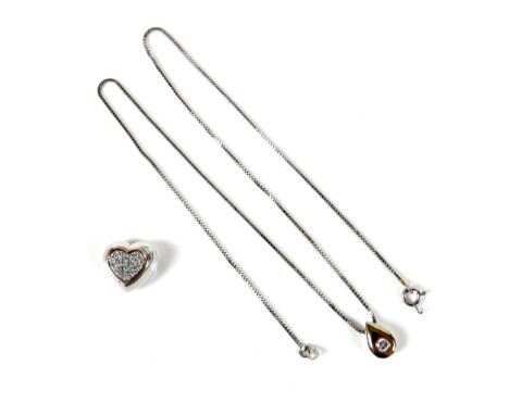 Two diamond set pendants, one 18k white gold in the form of a heart, set with thirteen round cut diamonds, each 2.0mm, 13.0 b