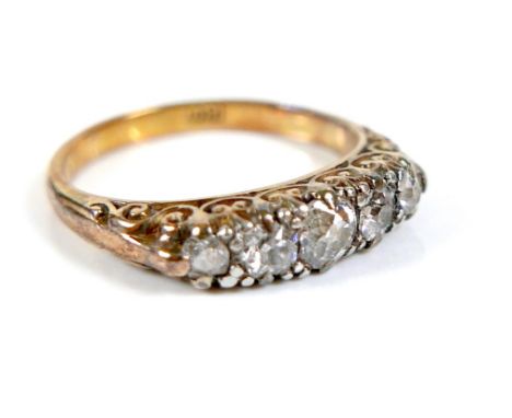 An 18ct yellow gold five stone diamond ring, the old cut stones of graduated size, largest 3.5mm, size K, 3.2g, in red Walker