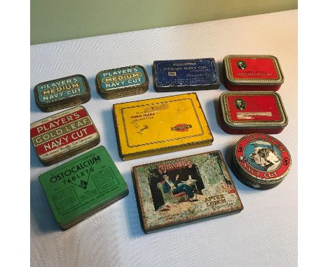 A quantity of vintage cigarette advertising tins. 