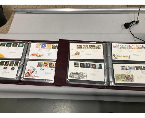 Two albums filled with first day covers ranging from 1985-1990-1991-1999 