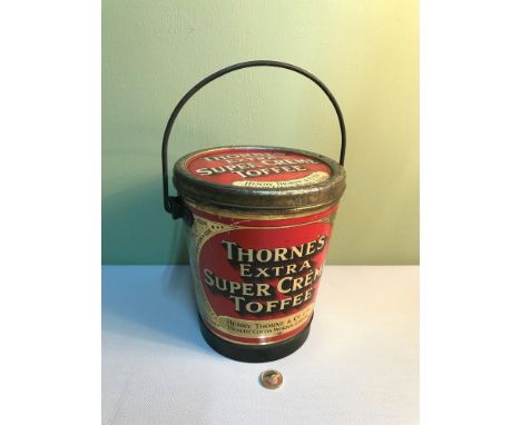 A Vintage advertising tin shaped like a bucket, for Thorne's Extra Super Creme Toffee, Measures 21cm in height (handle down) 