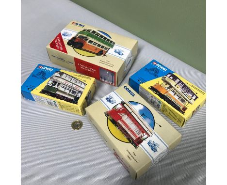 A Lot of 4 Corgi Bus and tram models boxed. 