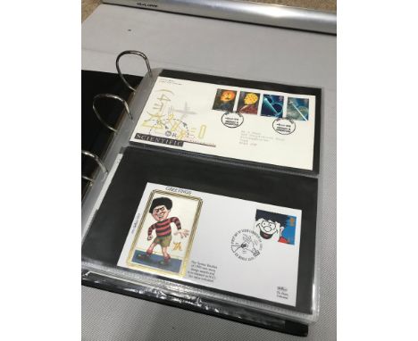 Album of first day covers, mixed genres which includes Dennis the Menace, Royalty and Nautical and racing. 