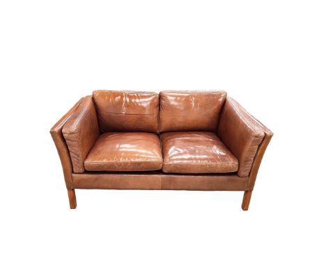 STOUBY SOFA. Danish in tan leather, 75cm H x 146cm W x 80cm D.