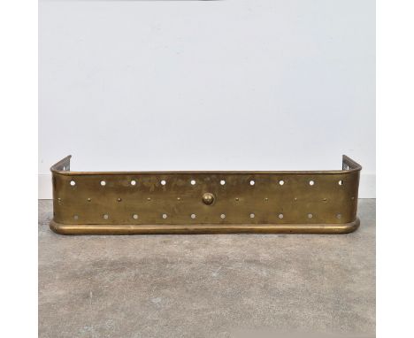 VICTORIAN BRASS FENDER. Pierced form, 25cm H x 124cm W x 32cm D.