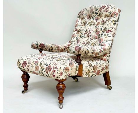 VICTORIAN WALNUT ARMCHAIR. Howard style with floral tapestry manner upholstery, buttoned back and turned tapering front suppo
