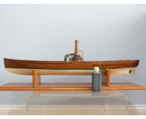 A vintage live steam scratch built wooden model Steam Launch,&nbsp;exposed wooden deck and hull, underside painted green and 