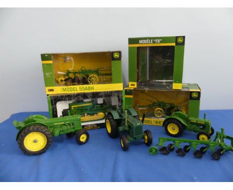 Four boxed John Deere 1:16 scale models by Speccast and ERTL, including a Model 44 plow, model 55ABH plow, a model FB grain d