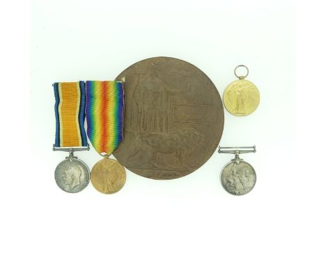 A W.W.I Memorial Plaque or 'Death Penny' named to William Mitchell, together with two pairs of W.W.I Medals, British War Meda