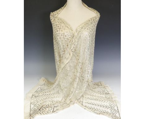 Vintage fashion; an early 20thC Egyptian Assuit cream and yellow metal shawl, the whole with geometric decoration, L 200cm x 