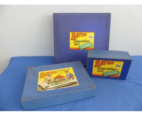 Three BAYKO building sets, consisting of a 2X Building set, a 2X converting set and a 3X converting set, please note sets con