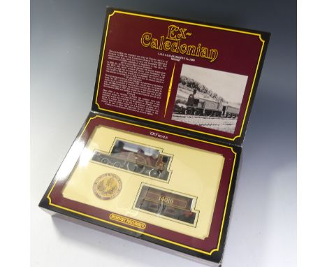 Hornby Railways: An “00” gauge R.763 L.M.S. 4-2-2 Locomotive and tender (Ex Caledonian) No.14010, boxed, and three other loco