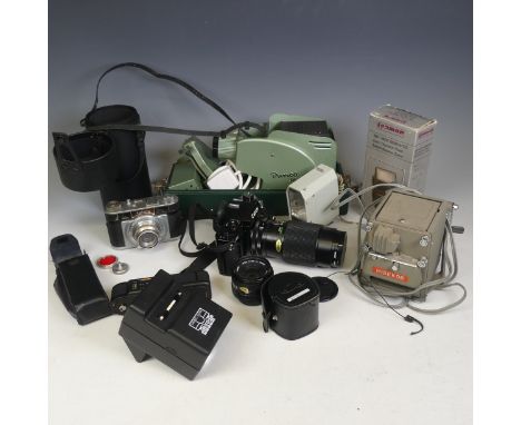 A quantity of vintage Photographic Equipment, including, Canon A-1 SLR 35mm camera with FD 50mm f1.8 lens and Vivitar 75-205m