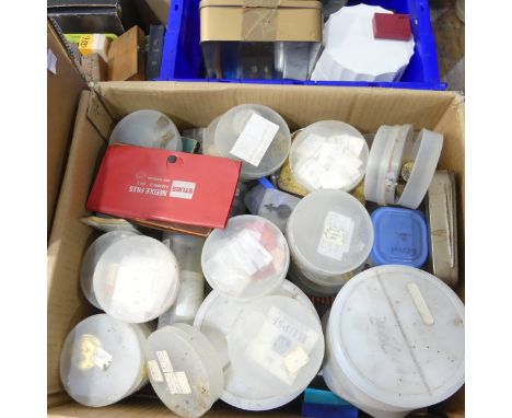 A large quantity of vintage watch and clock makers tools, spare parts inc; dials, movements, straps and faces, also with some