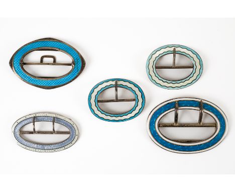 FIVE SILVER AND ENAMELLED OVAL BUCKLES (5)Comprising; the largest blue and white enamelled buckle, Birmingham 1910, no maker'