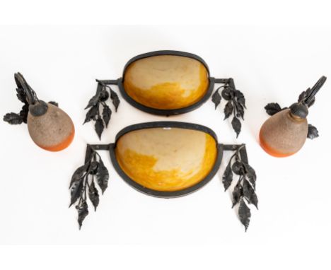 A PAIR OF FRENCH WROUGHT-IRON AND MOTTLED GLASS WALL LIGHTS AND ANOTHER PAIR OF RETHONDES GLASS AND WROUGHT-IRON MOUNTED WALL