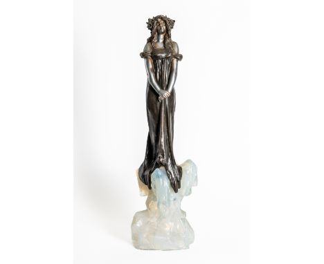 JULIEN CAUSSE (FRENCH 1869-1914): AN ART NOUVEAU SILVERED AND PATINATED BRONZED SPELTER FIGURE ‘FEE DES GLACES’ OR 'THE ICE M