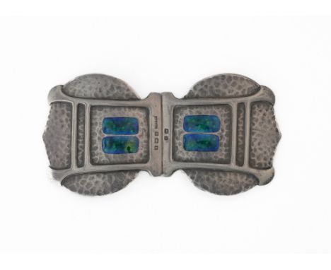 A SILVER AND ENAMELLED TWO PIECE WAISTBELT BUCKLEWith Art Nouveau decoration on a martele cast ground, with blue/green enamel