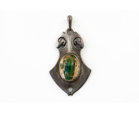 AN ART NOUVEAU HAMMERED SILVER PENDANTBezel set with a oval cabochon of beryl to the centre, with makers mark for William Hai