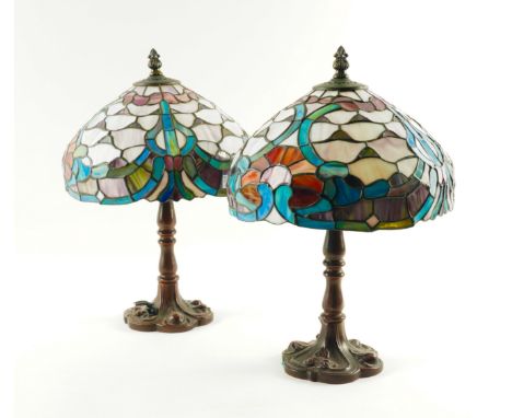 A PAIR OF TIFFANY STYLE STAINED AND LEADED GLASS MOUNTED TABLE LAMPS (2)20th Century
The shades with marbled stained glass pa