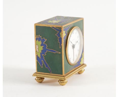 ZENITH: A CHAMPLEVÉ ENAMEL AND BRASS TRAVELLING ALARM CLOCK, CASEDCirca 1920s, white enamel dial with Arabic numerals and out