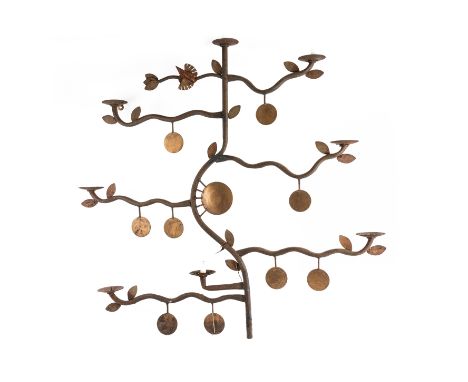 A WROUGHT IRON EIGHT LIGHT TREE SHAPED WALL MOUNTED CANDELABRUMLate 20th Century
With a stylised bird and gilt disc fruit and