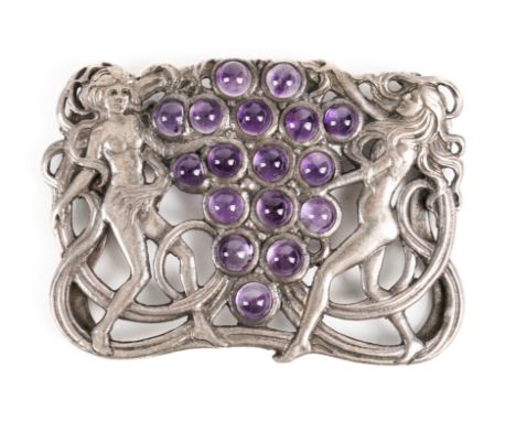A RAMSDEN AND CARR SILVER AND AMETHYST CHOKER RIBBON SLIDEOf shaped rectangular form, the centre as a bunch of grapes mounted