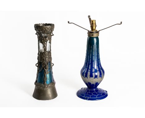 AN ART NOUVEAN PEWTER ALLOY MOUNTED LOETZ PAPILLON STYLE GLASS VASE AND A TABLE LAMP (2)Early 20th Century
Modelled with sinu