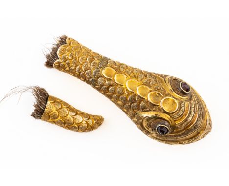 A VICTORIAN GOLD AND GARNET SERPENTS HEADWith textured scale engravings to the surface and paste set eyes, with an associated