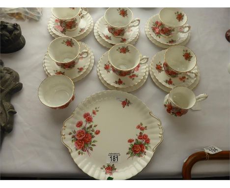 ROYAL ALBERT CENTENNIAL ROSE PATTERN TEASET twenty one pieces, comprising six cups, saucers and plates, milk jug, sugar bowl 