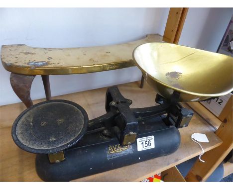 VICTORIAN BRASS KETTLE STAND raised on shaped legs, and a set of vintage Avery kitchen scales (2)
