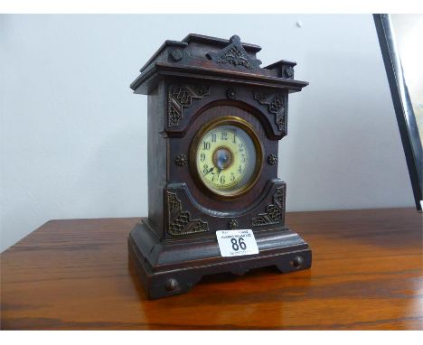 VICTORIAN MANTEL CLOCK with enamel face in carved wood architectural case, musical chime (for attention)